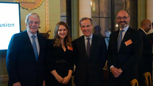 Sir John Major and Mark Carney with the SeeAbility team at the Bank of England