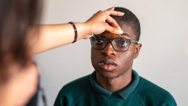 A boy having his eyes tested