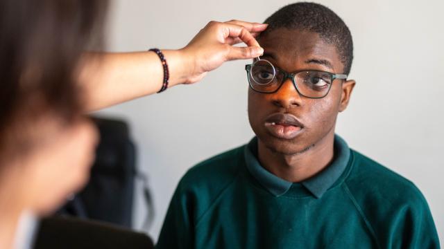 A person having an eye test at a special school 